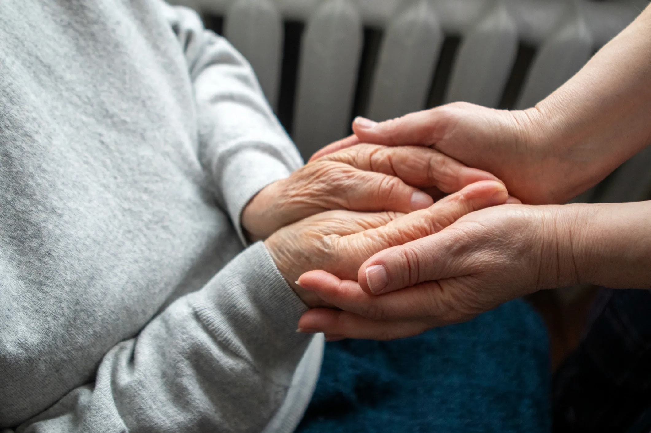 Compassionate caregiver with a dementia patient